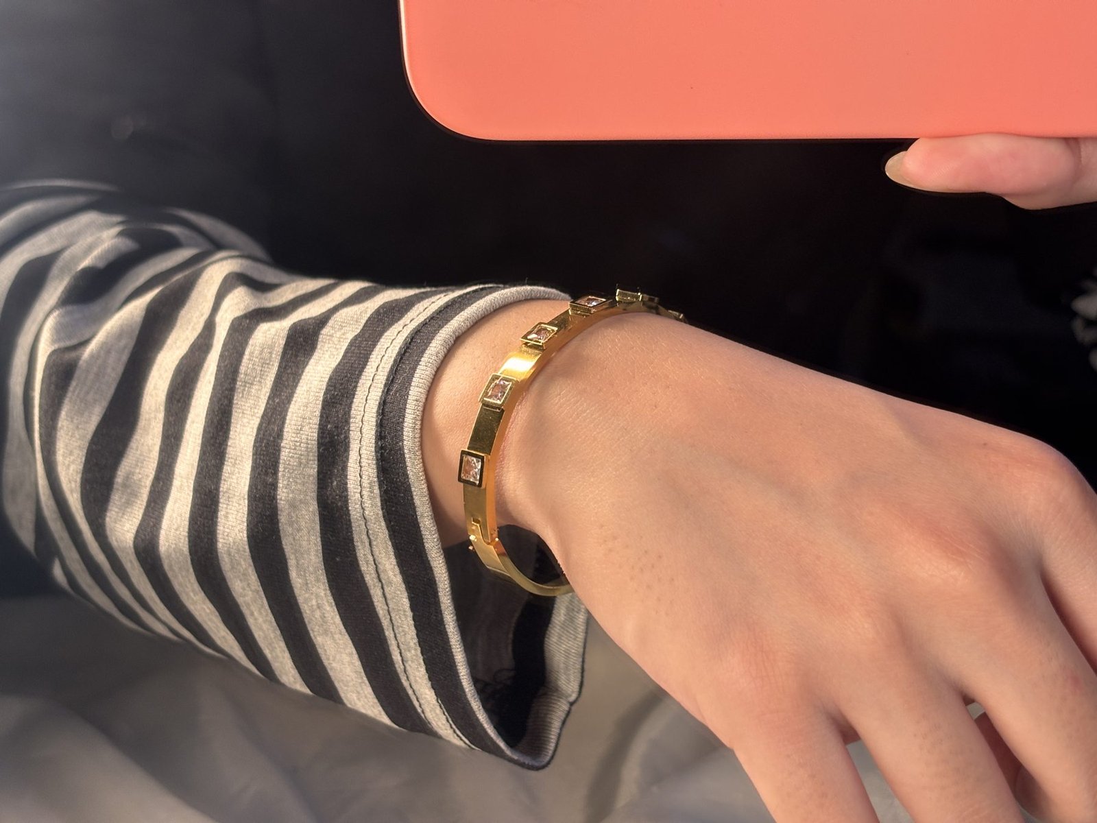Close view of the Cinderella Bracelet on the wrist catching the light