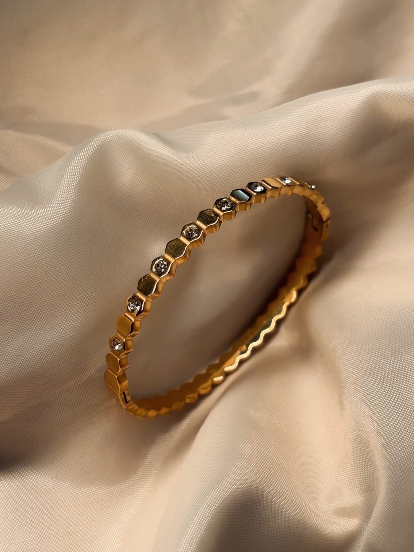 The Golden Hour Bangle showing stones set continuously around the bangle