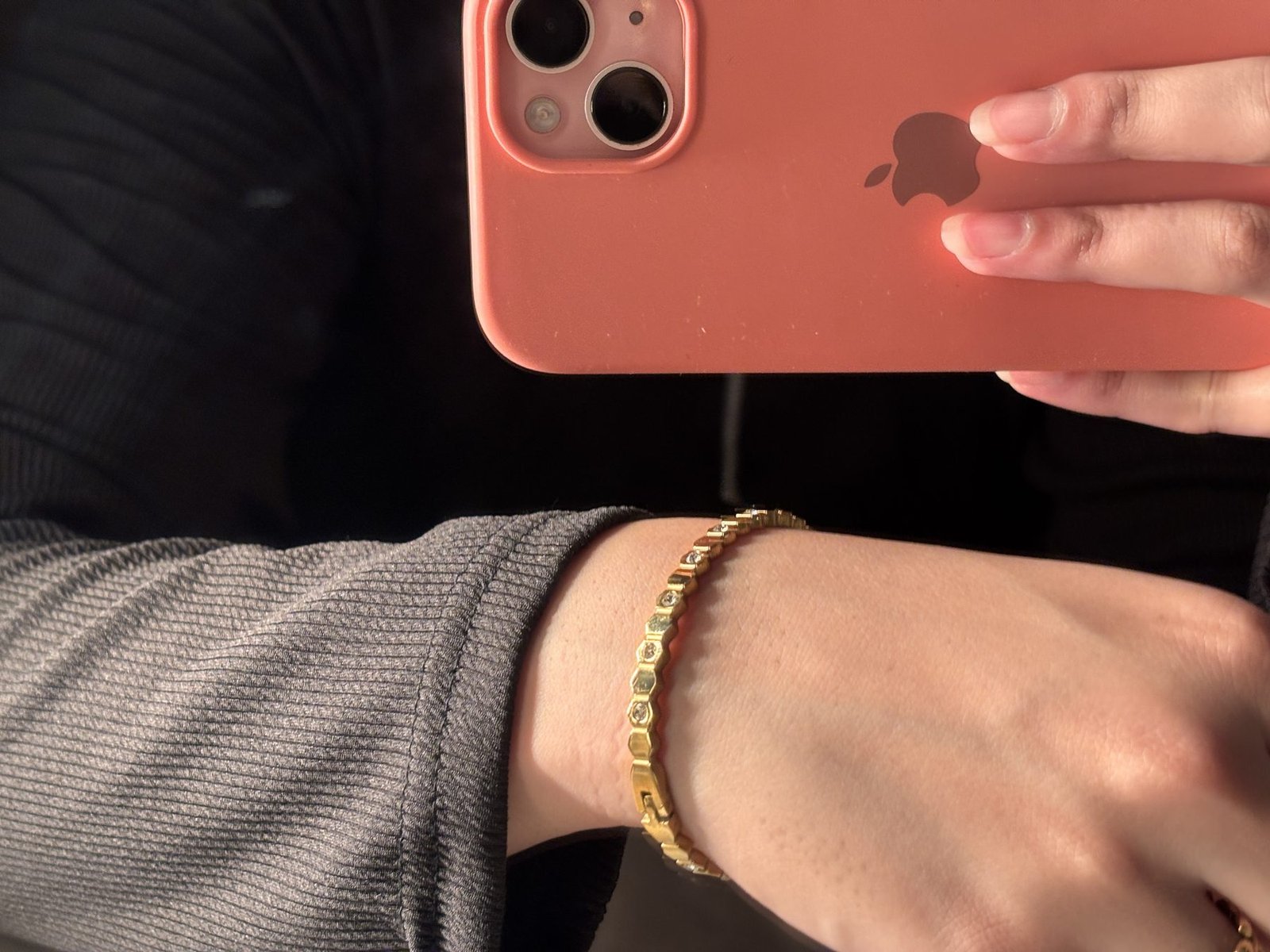 The Golden Hour Bangle worn on the wrist in natural light