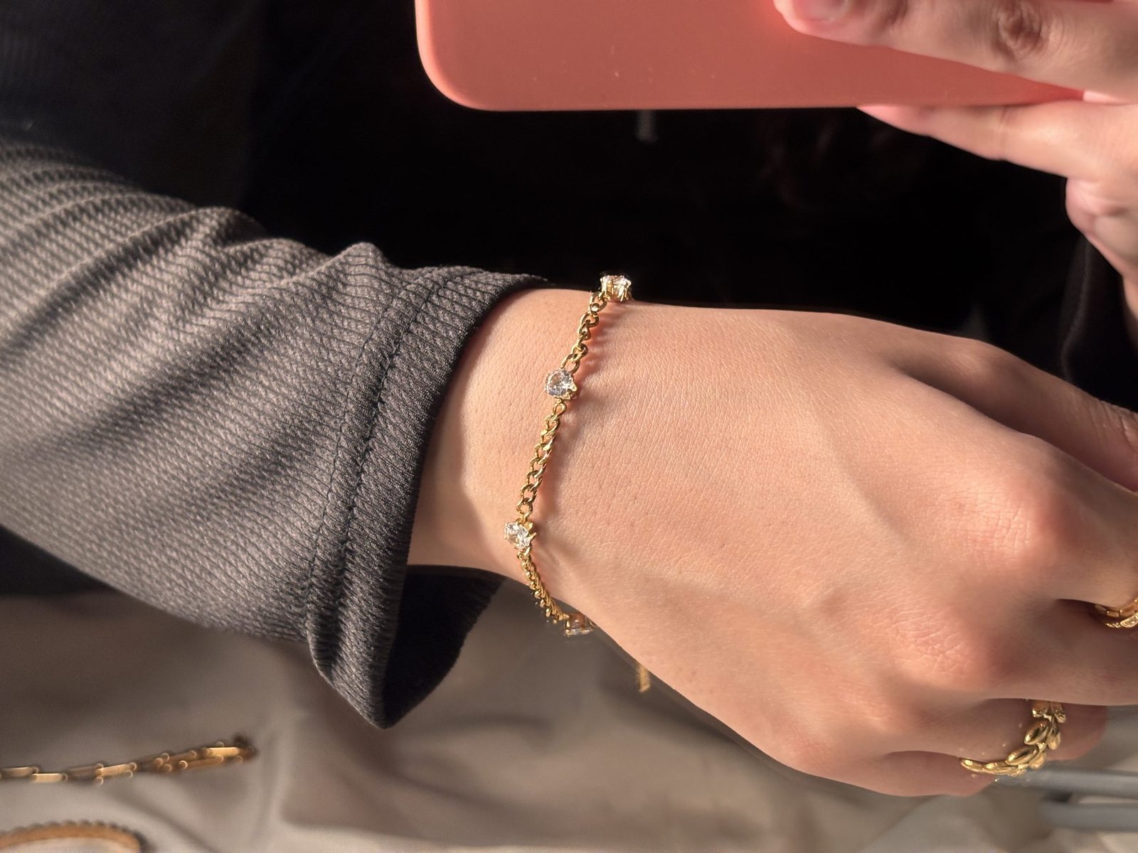 The Minimal Bracelet worn on the wrist showing its fine chain