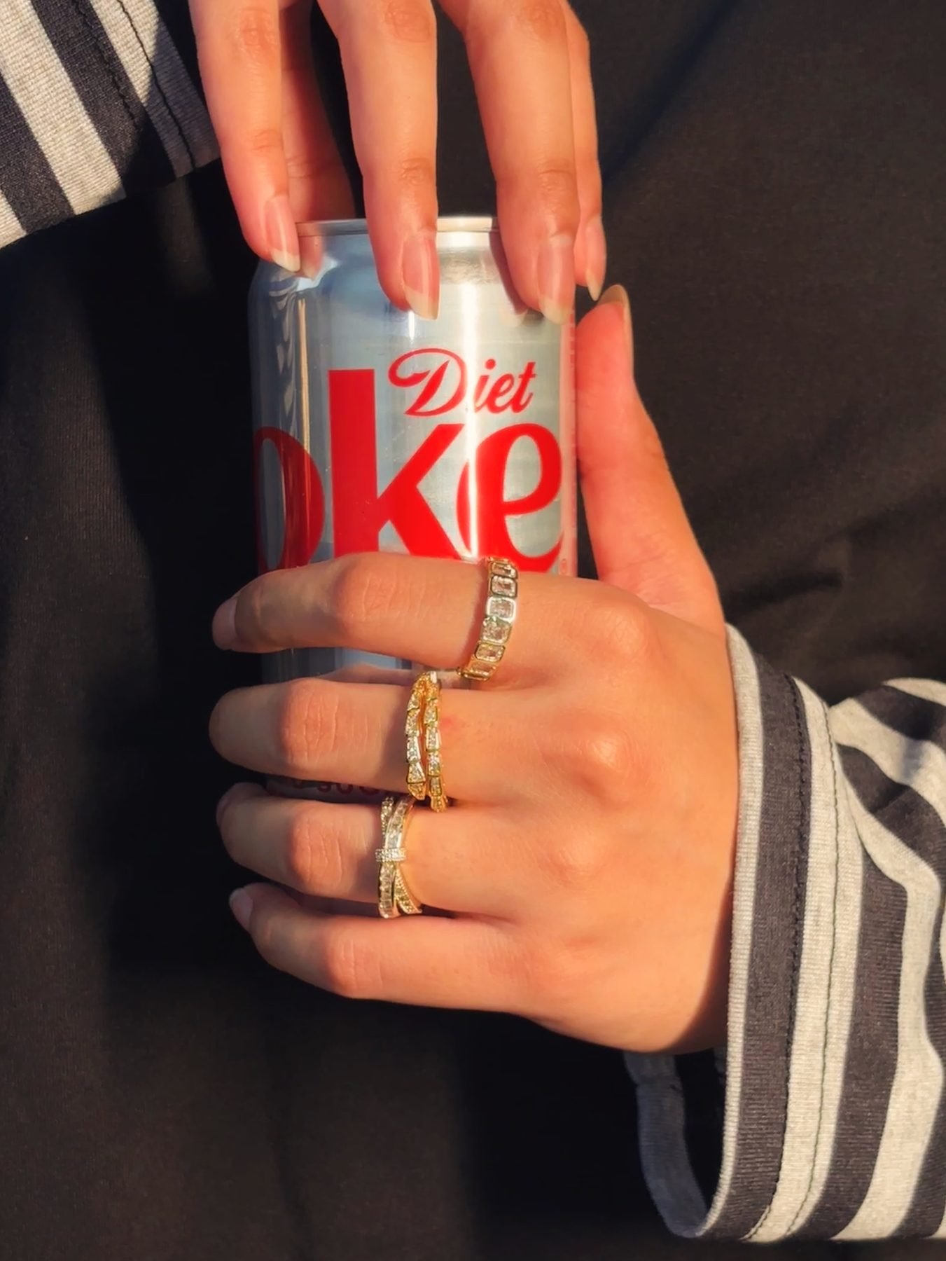 Gold stacking rings worn on the hand