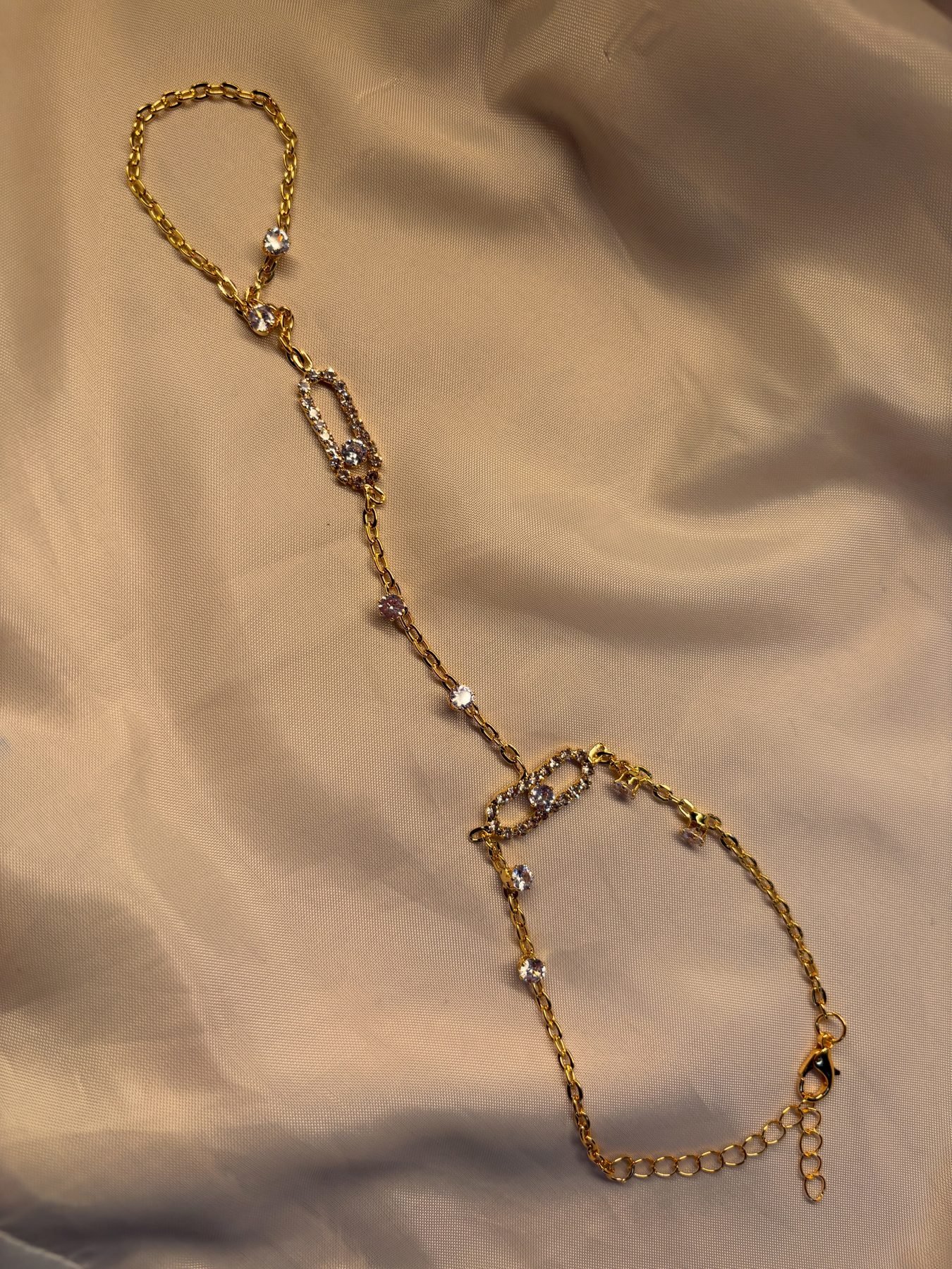Detail of the oval American diamond links on The Statement Hand Chain